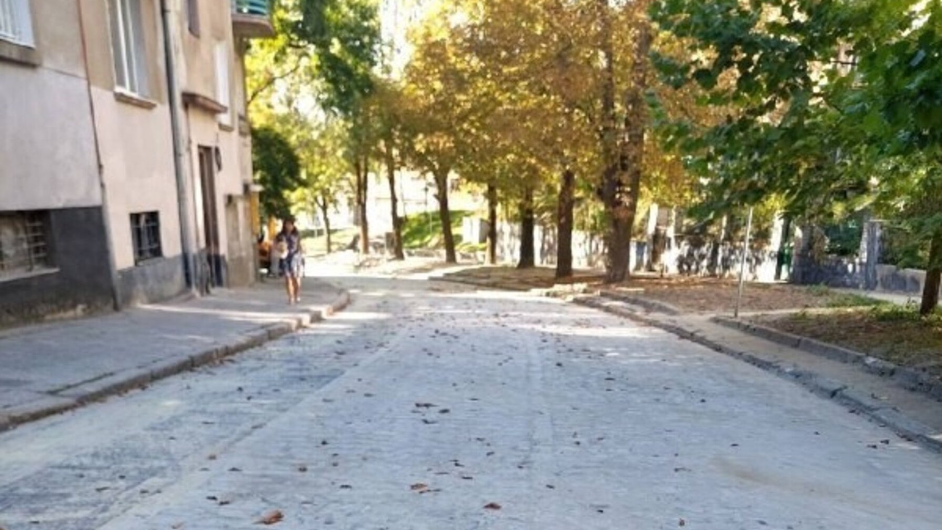 Відремонтована проїжджа частина вулиці Кубійовича у Львові з бруківкою між вулицею Снопківською та площею Вишиваного